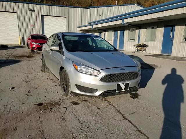 2015 Ford Focus Se VIN: 1FADP3F21FL206464 Lot: 77816534