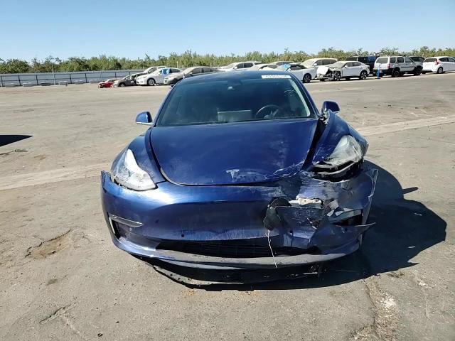 2020 Tesla Model 3 VIN: 5YJ3E1EAXLF658498 Lot: 76928534