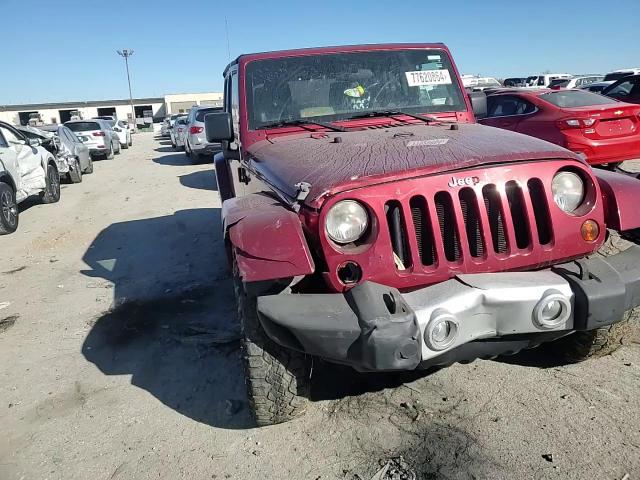 2011 Jeep Wrangler Unlimited Sahara VIN: 1J4BA5H1XBL558403 Lot: 77620864