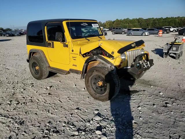 2002 Jeep Wrangler / Tj Sport VIN: 1J4FA49S92P735597 Lot: 76953634