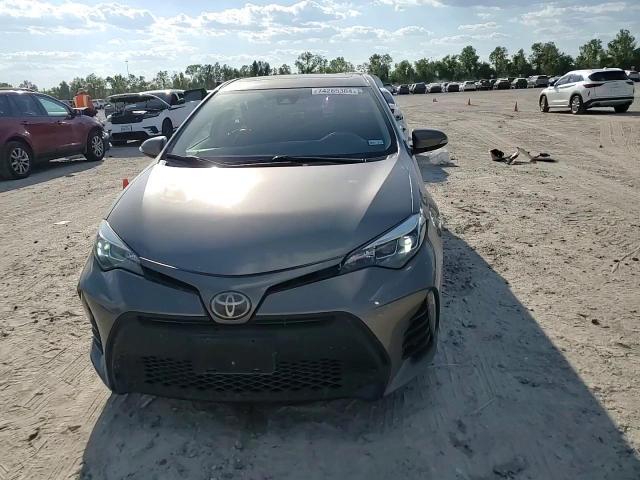 2018 Toyota Corolla L VIN: 5YFBURHE7JP818642 Lot: 74265304