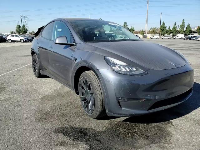 2022 Tesla Model Y VIN: 7SAYGDEE0NF423232 Lot: 77903804