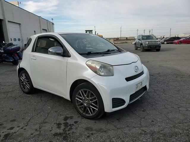 2012 Toyota Scion Iq VIN: JTNJJXB02CJ011910 Lot: 77388604