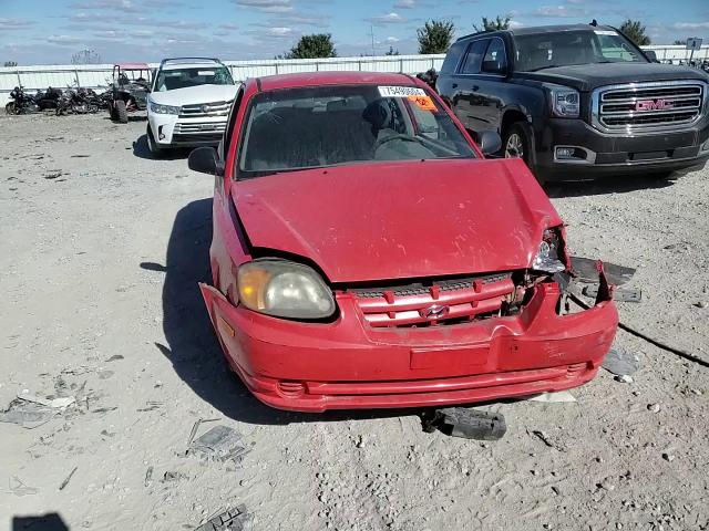 2003 Hyundai Accent L VIN: KMHCF35C33U255489 Lot: 75490604