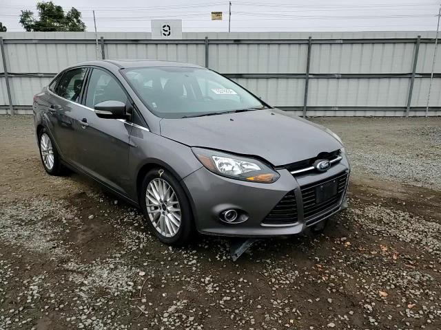 2014 Ford Focus Titanium VIN: 1FADP3J22EL420997 Lot: 76318834