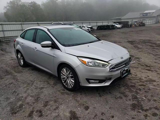 2016 Ford Focus Titanium VIN: 1FADP3J21GL243247 Lot: 74395874