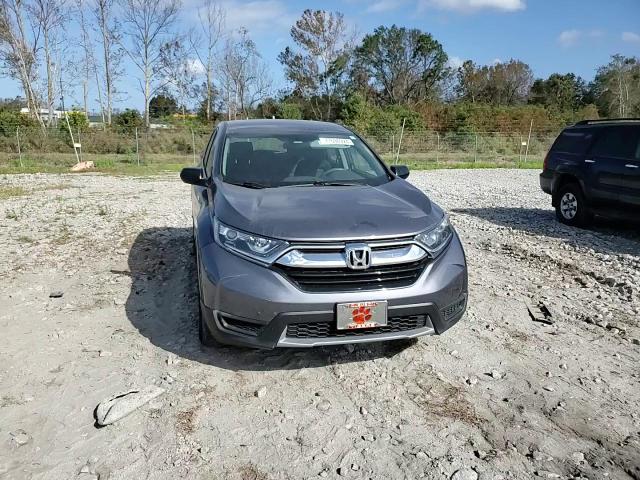 2018 Honda Cr-V Lx VIN: 2HKRW5H36JH401381 Lot: 77696924