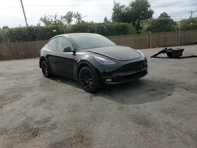 2023 Tesla Model Y VIN: 7SAYGDEE4PA163076 Lot: 75417404