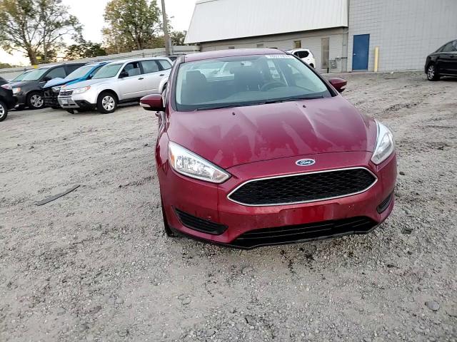 2016 Ford Focus Se VIN: 1FADP3F21GL379919 Lot: 76077874