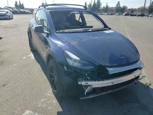 2023 Tesla Model Y VIN: 7SAYGDEE7PA066471 Lot: 75518924