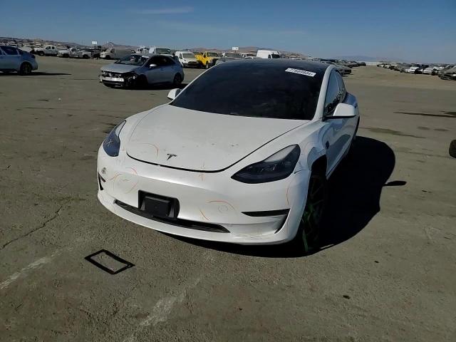 2021 Tesla Model 3 VIN: 5YJ3E1EA6MF077288 Lot: 77689934