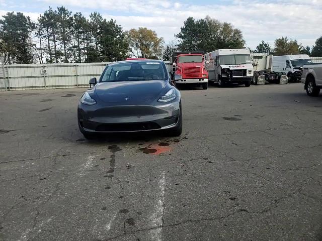 2023 Tesla Model Y VIN: 7SAYGDEE5PA067070 Lot: 77278764