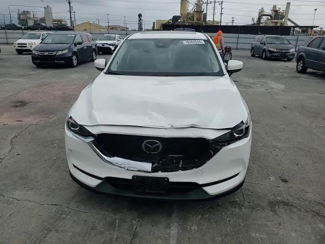 2021 Mazda Cx-5 Touring VIN: JM3KFBCM2M0467421 Lot: 76362244