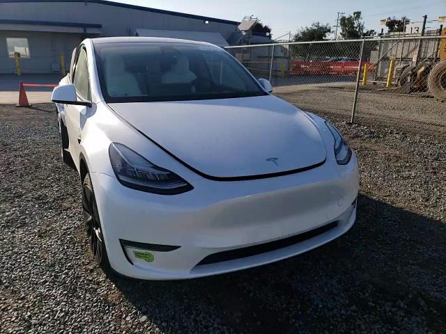 2023 Tesla Model Y VIN: 7SAYGDEE6PA089319 Lot: 74504124