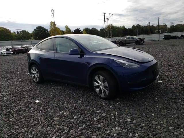 2023 Tesla Model Y VIN: 7SAYGDEE2PF592137 Lot: 76106944