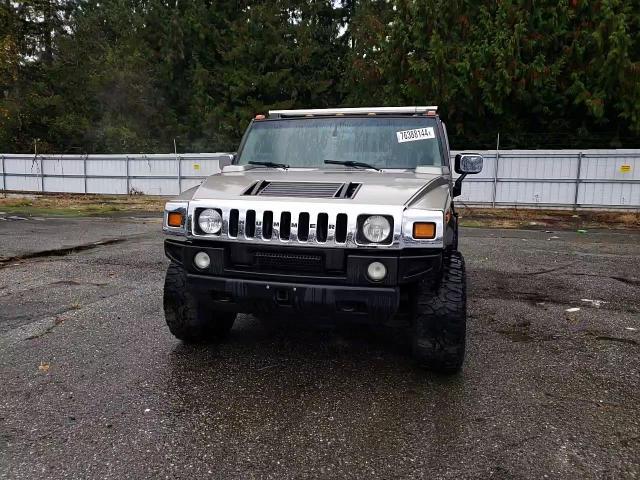 2003 Hummer H2 VIN: 5GRGN23U73H111109 Lot: 76388144