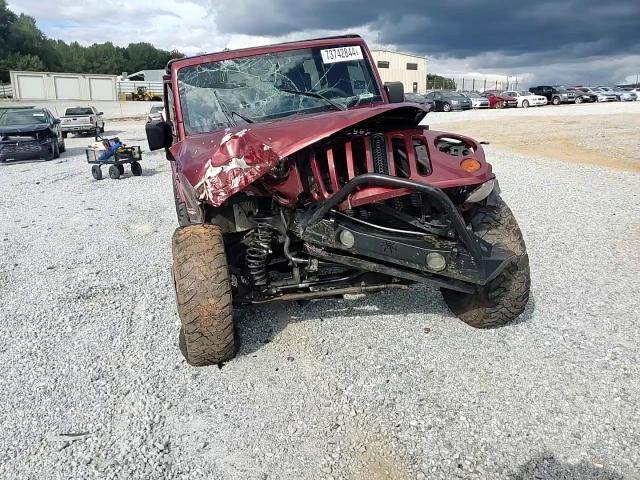 2007 Jeep Wrangler Sahara VIN: 1J4GA59177L197479 Lot: 73742844