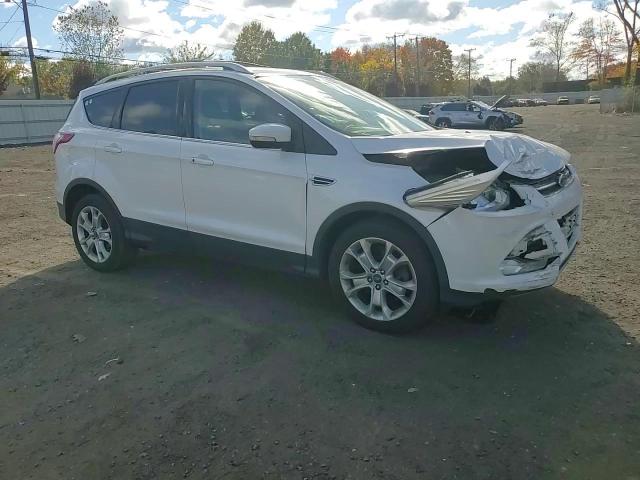 2014 Ford Escape Titanium VIN: 1FMCU9J96EUB90708 Lot: 76240814