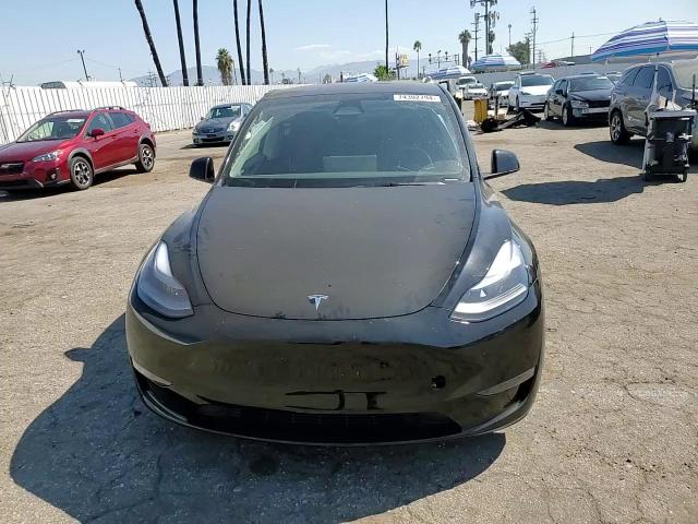 2023 Tesla Model Y VIN: 7SAYGDEE0PA167786 Lot: 74302794