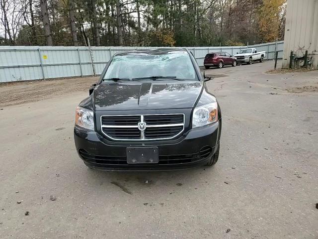 2009 Dodge Caliber Sxt VIN: 1B3HB48A79D148493 Lot: 77770094