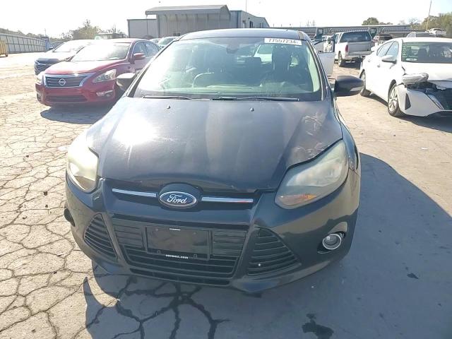 2012 Ford Focus Titanium VIN: 1FAHP3N24CL306671 Lot: 77557234