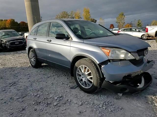 2007 Honda Cr-V Lx VIN: JHLRE48347C095267 Lot: 76138974