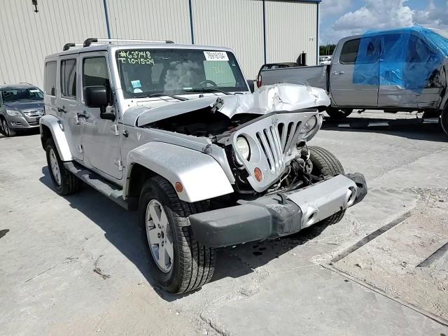 2012 Jeep Wrangler Unlimited Sahara VIN: 1C4HJWEG5CL100090 Lot: 76916104