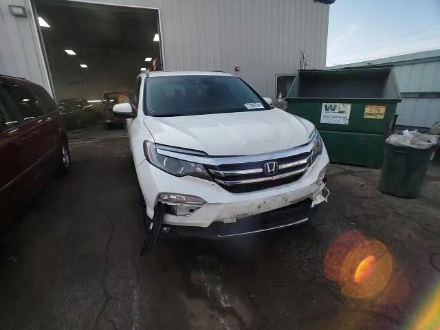 2017 Honda Pilot Elite VIN: 5FNYF6H09HB080324 Lot: 77824734