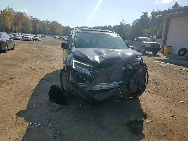 2021 Honda Pilot Touring VIN: 5FNYF5H65MB013423 Lot: 77148194