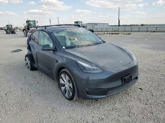 2023 Tesla Model Y VIN: 7SAYGAEEXPF882902 Lot: 74390484