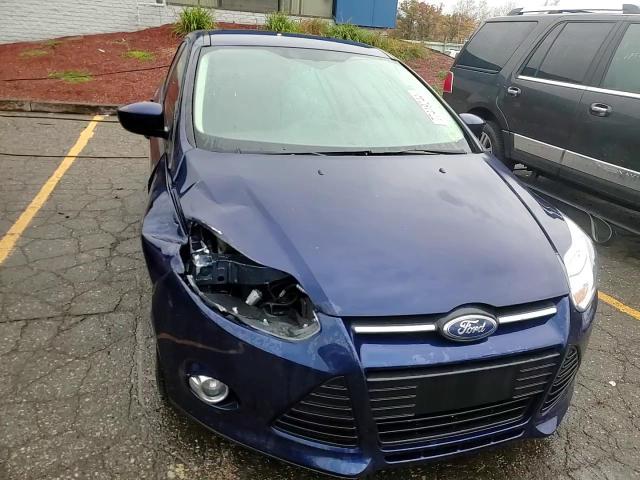 2012 Ford Focus Se VIN: 1FAHP3F25CL108695 Lot: 77419244