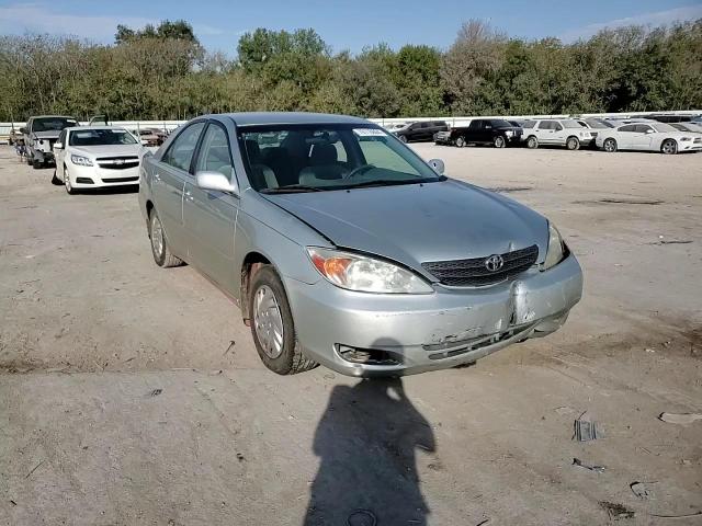 2003 Toyota Camry Le VIN: JTDBE32K730233047 Lot: 76118604