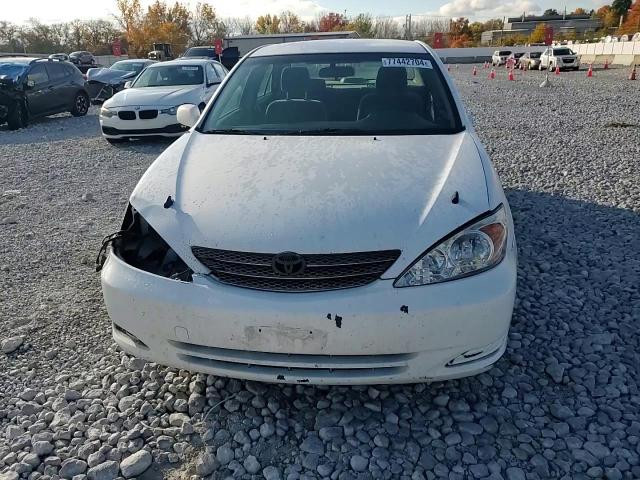 2004 Toyota Camry Le VIN: JTDBE32K440265584 Lot: 77442704