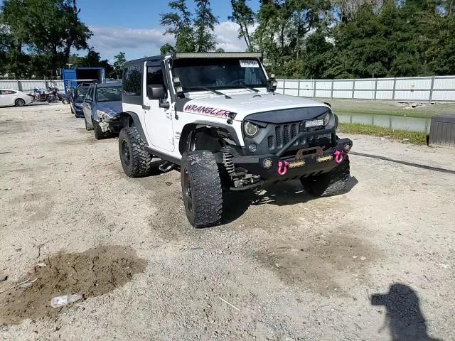 2016 Jeep Wrangler Sport VIN: 1C4GJWAG1GL212179 Lot: 76594184