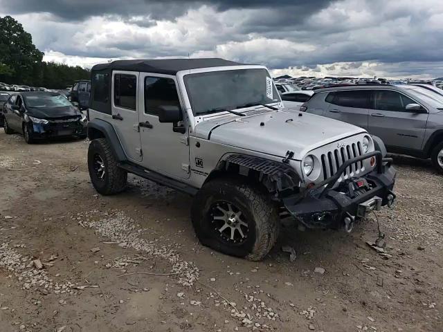 2012 Jeep Wrangler Unlimited Sport VIN: 1C4BJWDG1CL166384 Lot: 74033244