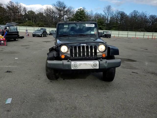 2008 Jeep Wrangler Unlimited Sahara VIN: 1J4GA59198L505334 Lot: 74088544