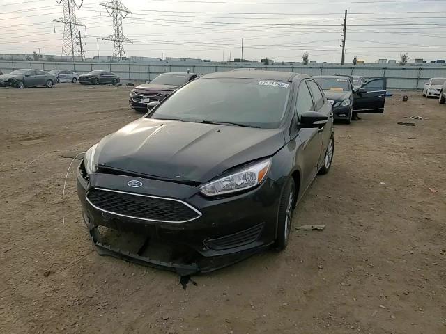 2017 Ford Focus Se VIN: 1FADP3F29HL339296 Lot: 75214004