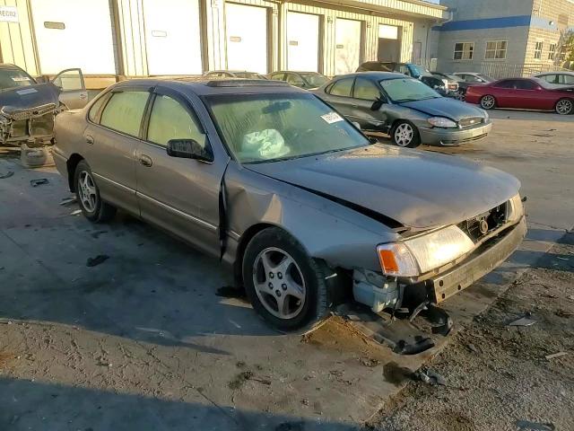 1999 Toyota Avalon Xl VIN: 4T1BF18B8XU313590 Lot: 76975134