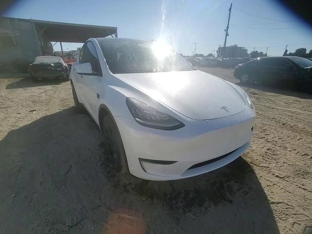 2023 Tesla Model Y VIN: 7SAYGDEEXPA071762 Lot: 77800954