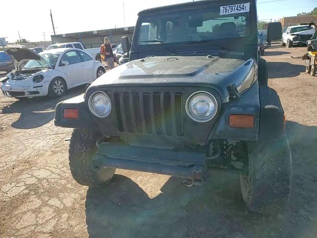 1997 Jeep Wrangler / Tj Sport VIN: 1J4FY19S0VP494379 Lot: 76797454