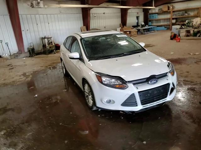 2014 Ford Focus Titanium VIN: 1FADP3J26EL182989 Lot: 76480334