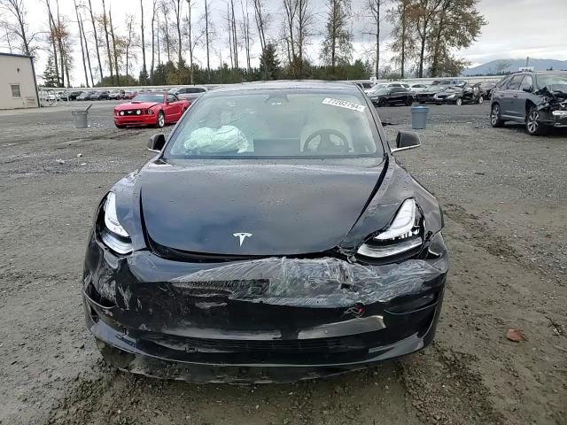 2019 Tesla Model 3 VIN: 5YJ3E1EB1KF390531 Lot: 77202794