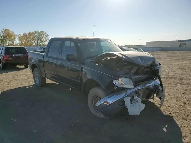 2001 Ford F150 Supercrew VIN: 1FTRW08L61KC30586 Lot: 74439124