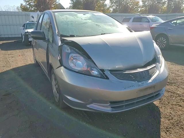 2009 Honda Fit VIN: JHMGE87279S060654 Lot: 76901724