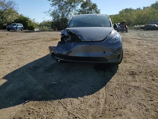 2023 Tesla Model Y VIN: 7SAYGDEE9PA195182 Lot: 77071004