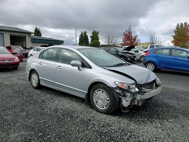 2010 Honda Civic Hybrid VIN: JHMFA3F23AS002606 Lot: 77990524