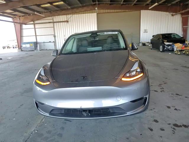 2024 Tesla Model Y VIN: 7SAYGDEE2RF106834 Lot: 89711075
