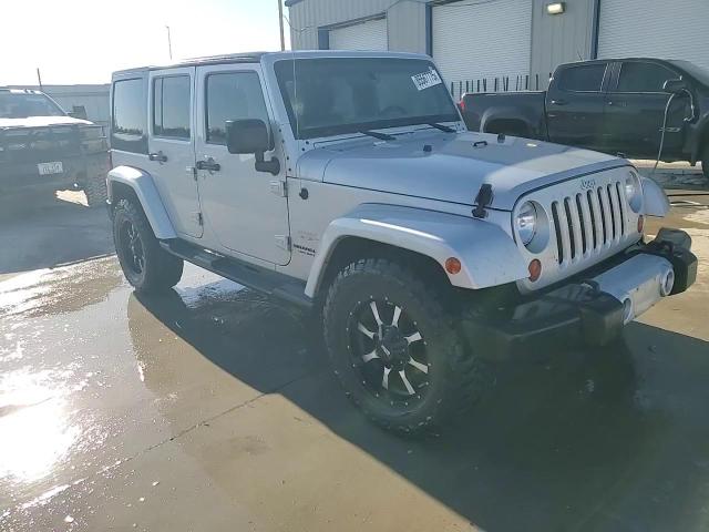 2012 Jeep Wrangler Unlimited Sahara VIN: 1C4BJWEG6CL228277 Lot: 85567775