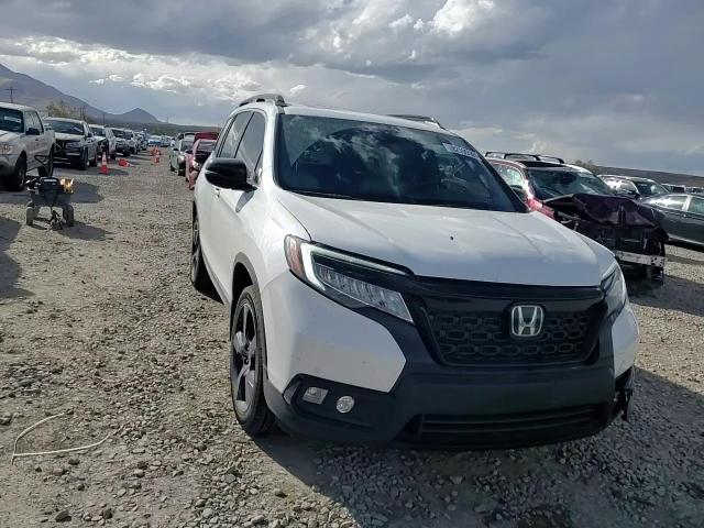 2021 Honda Passport Elite VIN: 5FNYF8H02MB039538 Lot: 82199595
