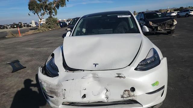 2023 Tesla Model Y VIN: 7SAYGDEE9PF585900 Lot: 89811725